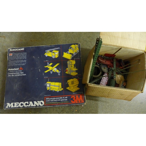 690 - A Meccano motorised set and additional Meccano spare parts