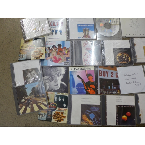 699 - The Beatles promotional CDs, some sealed including Help, McCartney Anthology, etc. (30)