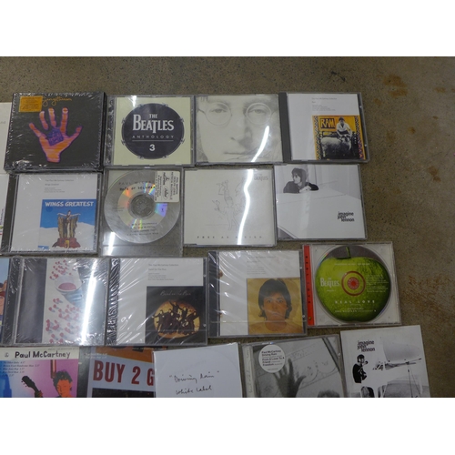 699 - The Beatles promotional CDs, some sealed including Help, McCartney Anthology, etc. (30)