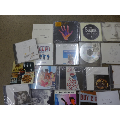 699 - The Beatles promotional CDs, some sealed including Help, McCartney Anthology, etc. (30)