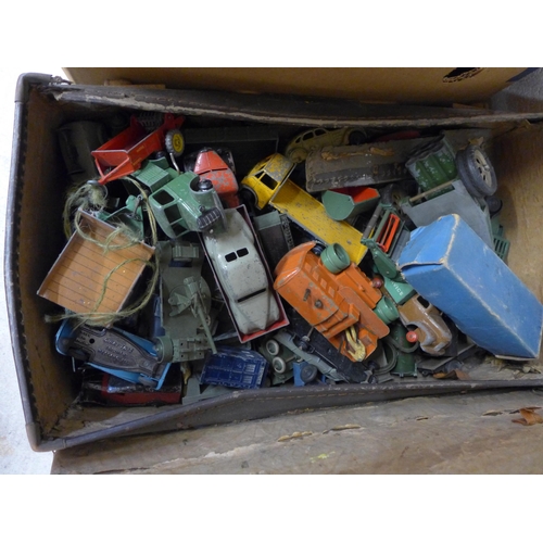 701 - A collection of die-cast model vehicles including a case full of early Dinky Toys, playworn