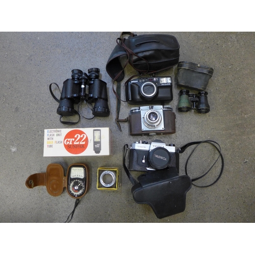 706 - A box of cameras, binoculars, light meter, etc., including Yashica TL Electro