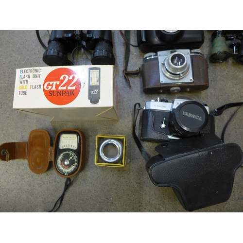 706 - A box of cameras, binoculars, light meter, etc., including Yashica TL Electro