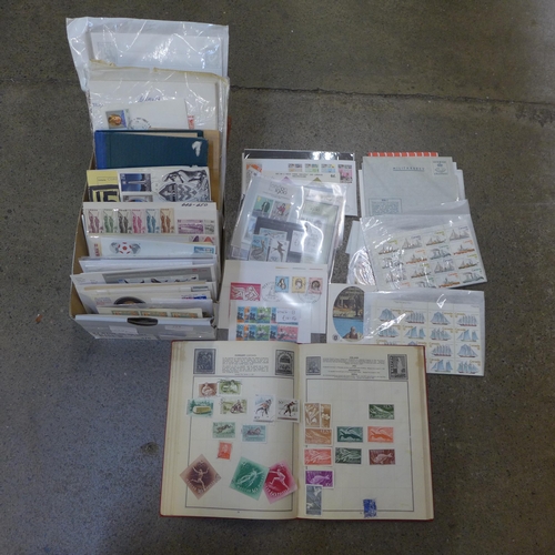 713 - Stamps; a box of stamps, covers, etc.