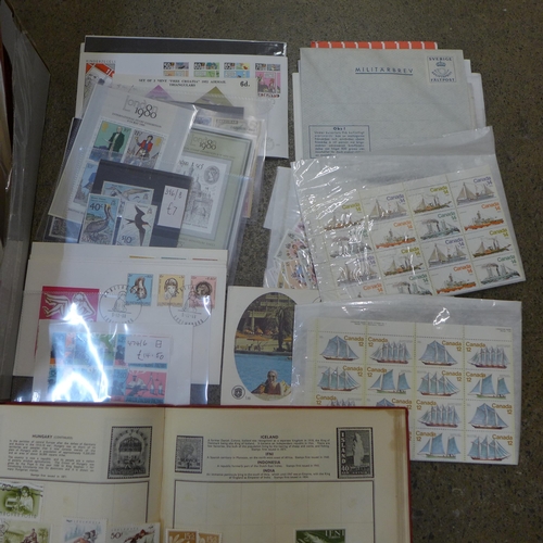 713 - Stamps; a box of stamps, covers, etc.