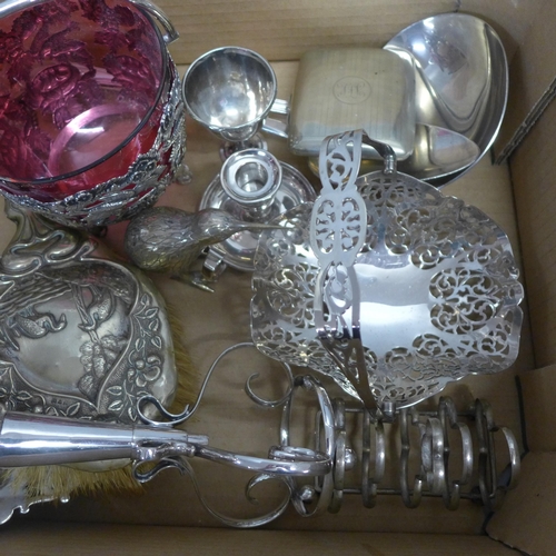 738 - A collection of plated ware including two pairs of vases and a basket with cranberry glass liner