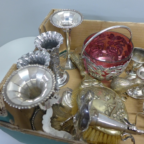 738 - A collection of plated ware including two pairs of vases and a basket with cranberry glass liner