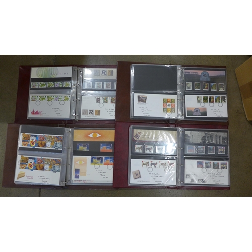 749 - Four albums of Royal Mail first day covers