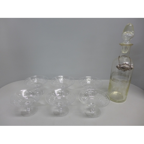 765 - A set of six early-20th Century coupe dishes with cut glass bowls and a whisky/spirit decanter with ... 