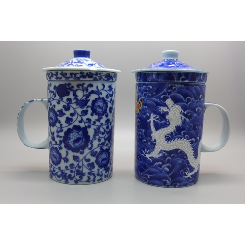 778 - Two oriental blue and white tea infusers