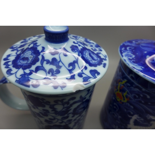 778 - Two oriental blue and white tea infusers