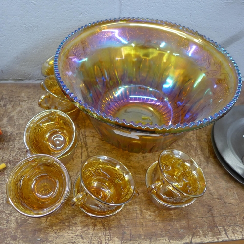 784 - A carnival glass punch bowl and twelve cups