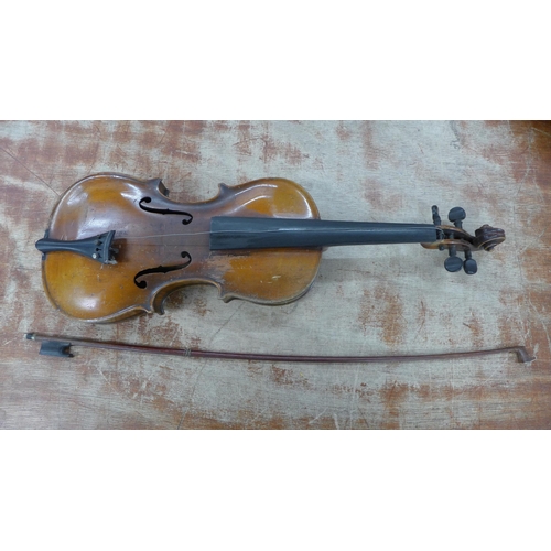 787 - A violin with bow, cased, length of back excluding button 35.5cm, parts missing