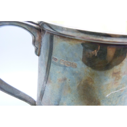 821 - A large silver mug, Sheffield 1947, 348g, height 12cm, (without inscription)