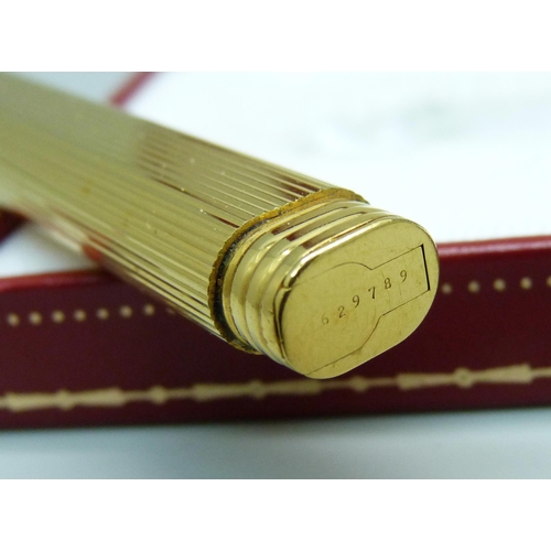 828 - A Must de Cartier ballpoint pen, boxed