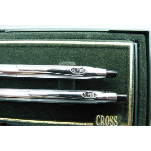 845 - A Cross propelling pencil and ballpoint pen set and a Waterman ballpoint pen