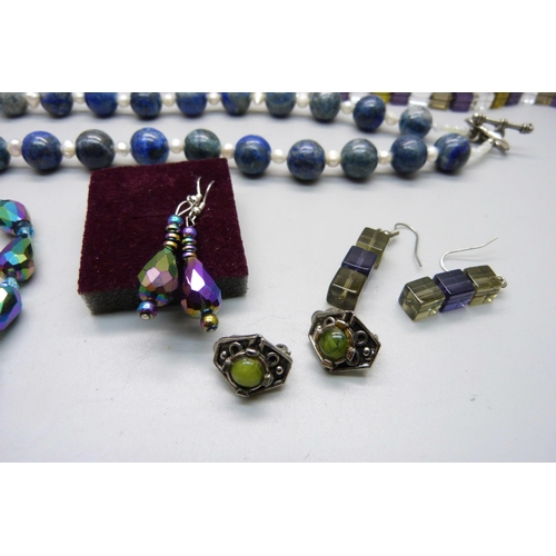 847 - Two costume necklaces with matching earrings, one other pair of earrings and a lapis lazuli necklace