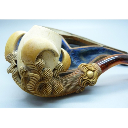 850 - A large carved Meerschaum pipe in the form of a claw, cased