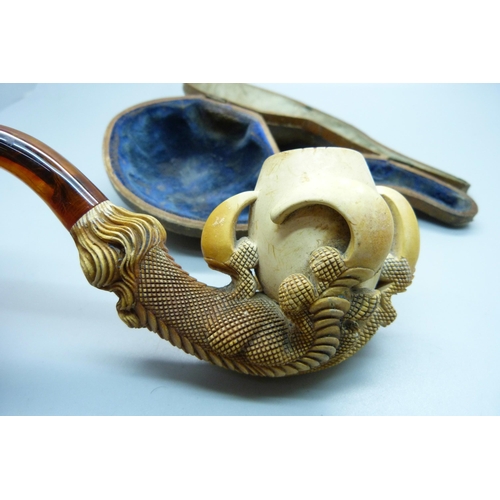 850 - A large carved Meerschaum pipe in the form of a claw, cased