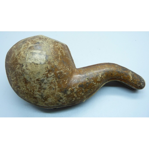 850 - A large carved Meerschaum pipe in the form of a claw, cased