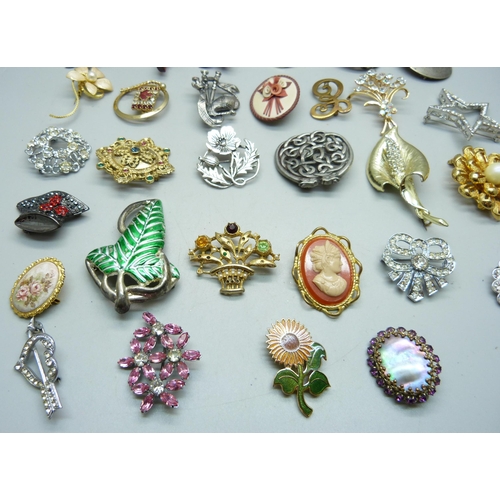 854 - Thirty brooches including vintage and Celtic style