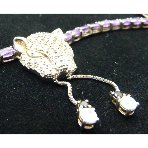 860 - A silver and amethyst panther necklace, 46cm