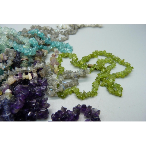 870 - Seventeen long gemstone necklaces including amethyst, garnet and malachite, one shorter necklace and... 