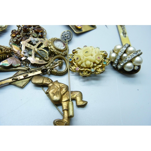 872 - A collection of brooches, hat pins, necklaces, crucifix, etc.