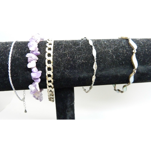 877 - A silver Pandora ring, a silver necklace, four silver bracelets, an amethyst quartz bracelet, earrin... 