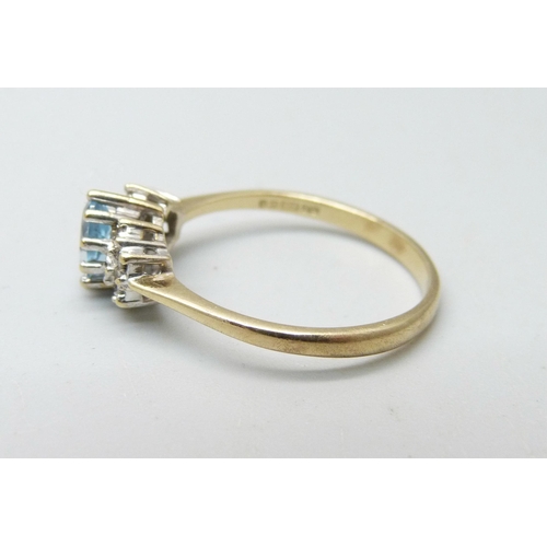 884 - A 9ct gold, blue stone and diamond ring, 2g, O