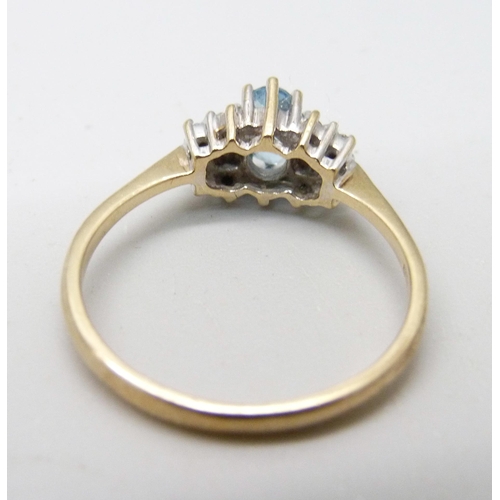 884 - A 9ct gold, blue stone and diamond ring, 2g, O