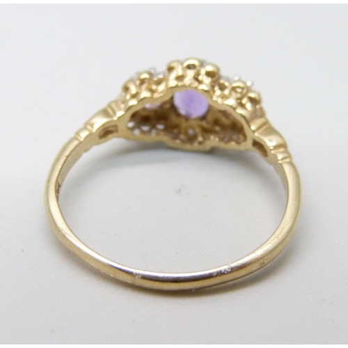 885 - A 9ct gold, amethyst and diamond ring, 2g, M