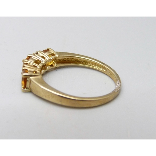 891 - A 9ct gold stone set ring, 2.1g, M