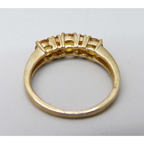 891 - A 9ct gold stone set ring, 2.1g, M