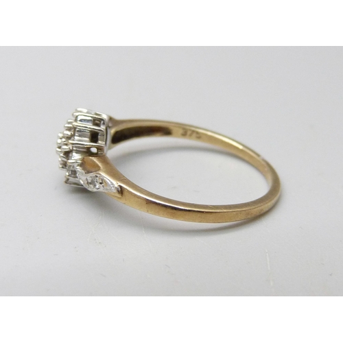 893 - A 9ct gold and diamond ring, 1.8g, M