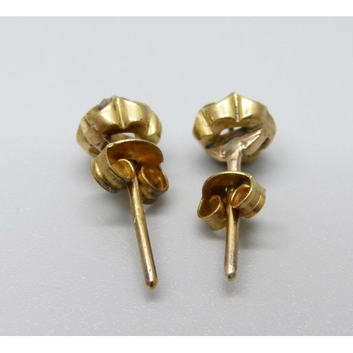 909 - A pair of vintage diamond ear studs, 2.1g