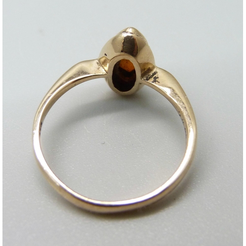 914 - A 9ct gold and marquise citrine ring, 2g, K