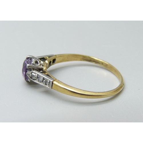 922 - An 18ct gold, platinum set amethyst and diamond ring, 2.2g, N