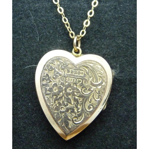 927 - An engraved 9ct gold locket and chain, Birmingham 1906, 4.5g