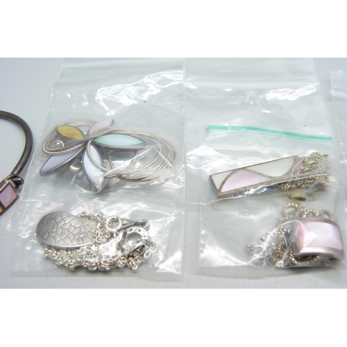 934 - Silver jewellery including pendants and chains, three pairs of earrings, bangle, etc.