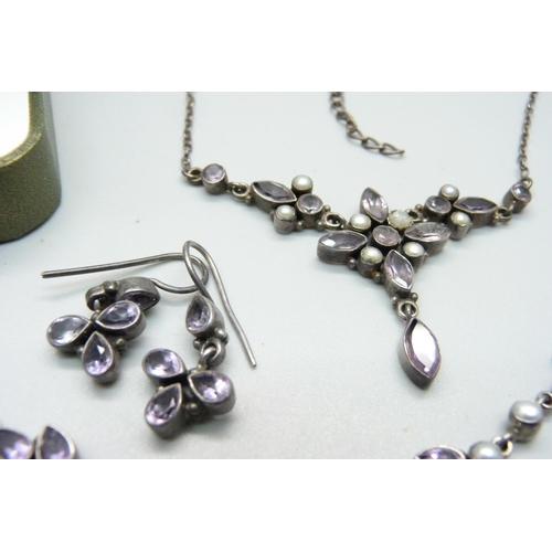 935 - Silver and amethyst jewellery including a necklet, bracelet, ring and a pair of earrings