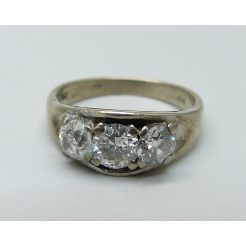 938 - An 18ct gold, three stone diamond ring, approximately 1.35ct diamond weight, 5.1g, N