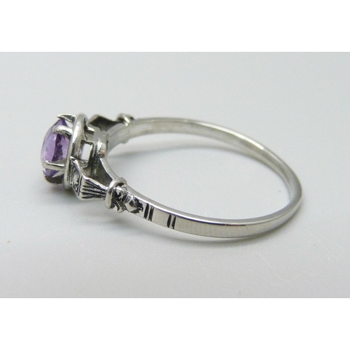 939 - A platinum and amethyst solitaire ring, 3.5g, S