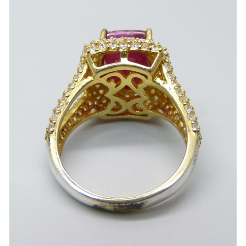 940 - A silver gilt, ruby and zircon ring, T