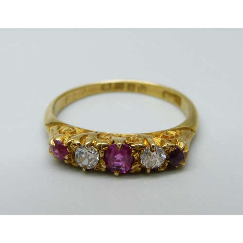 945 - An 18ct gold, ruby and diamond ring, London 1915, 2.5g, K