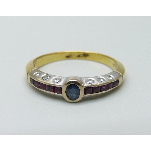 946 - An 18ct gold, ruby, sapphire and twelve diamond designer ring, 3.4g, N