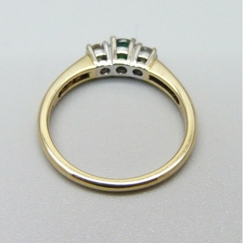 947 - An 18ct gold, emerald and diamond ring, 3.1g, N