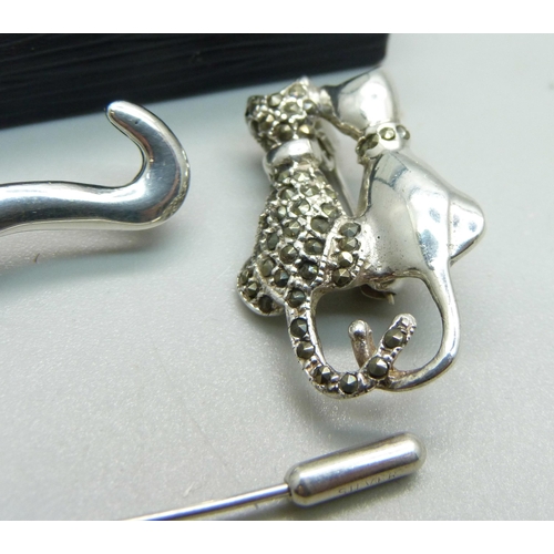 963 - Two silver cat brooches, a cat pin and a silver necklace