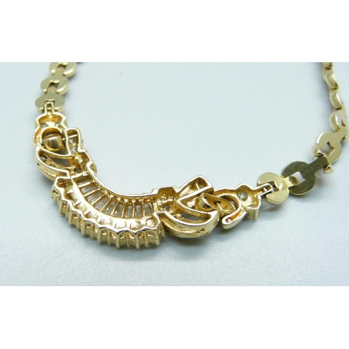 970 - A 14ct gold and diamond set necklace, 25.8g, 42cm