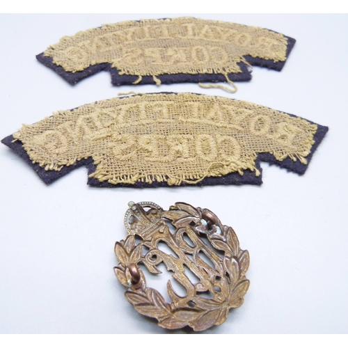 977 - Two Royal Flying Corps shoulder badges and a metal badge